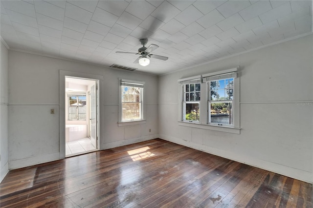 5603 Palmetto Rd, New Port Richey, FL 34652 - empty room featuring a ceiling fan, a wealth of natural light, and hardwood / wood-style flooring