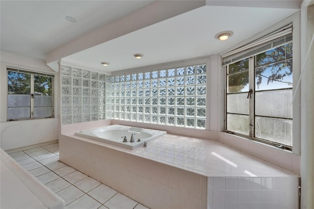5603 Palmetto Rd, New Port Richey, FL 34652 - full bathroom with tile patterned floors and a bath