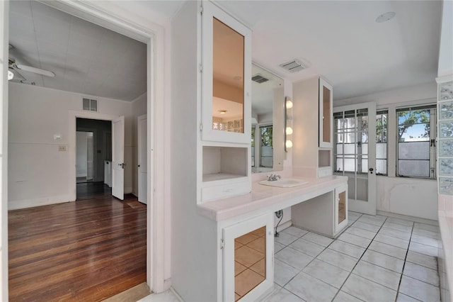 5603 Palmetto Rd, New Port Richey, FL 34652 - bathroom featuring tile patterned flooring, ceiling fan, and visible vents