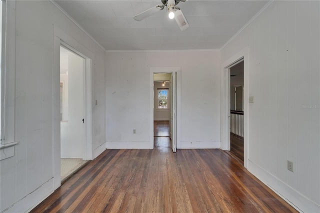 5603 Palmetto Rd, New Port Richey, FL 34652 - unfurnished bedroom featuring wood-type flooring, ornamental molding, baseboards, and ceiling fan