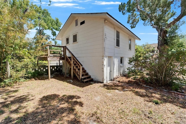 5603 Palmetto Rd, New Port Richey, FL 34652 - exterior space with a deck and stairway