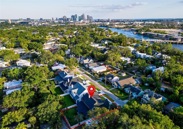 bird's eye view featuring a water view and a view of city