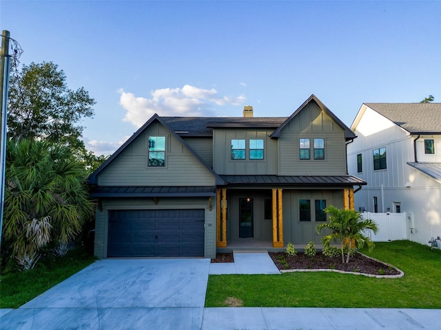 modern inspired farmhouse featuring a garage, a front lawn, board and batten siding, concrete driveway, and a porch