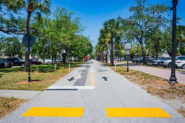 320 Crosswinds Dr, Palm Harbor, FL 34683 - view of asphalt street featuring traffic signs