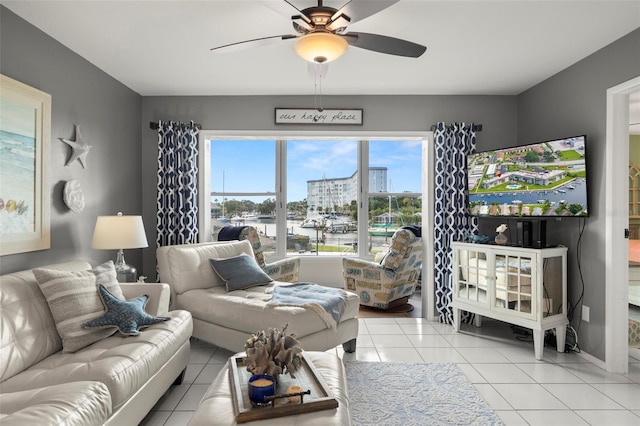 tiled living area featuring ceiling fan