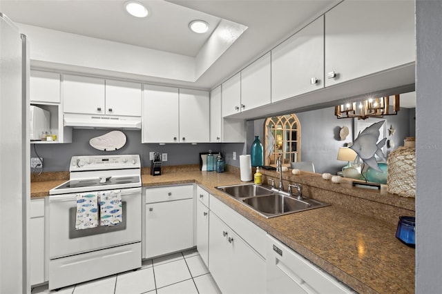 kitchen with a sink, under cabinet range hood, white cabinets, and white appliances