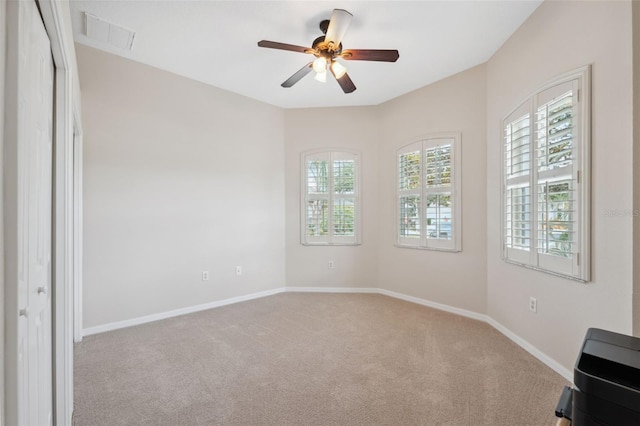 11220 Godwit Ct, New Port Richey, FL 34654 - carpeted empty room featuring baseboards and ceiling fan