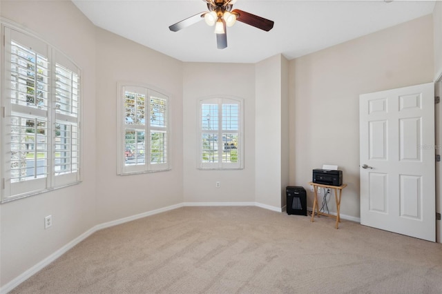 11220 Godwit Ct, New Port Richey, FL 34654 - carpeted spare room featuring ceiling fan and baseboards