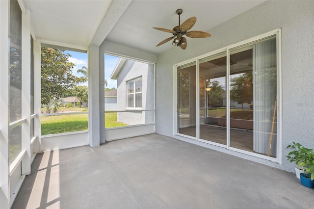 11220 Godwit Ct, New Port Richey, FL 34654 - unfurnished sunroom with ceiling fan