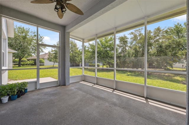 11220 Godwit Ct, New Port Richey, FL 34654 - unfurnished sunroom with a ceiling fan