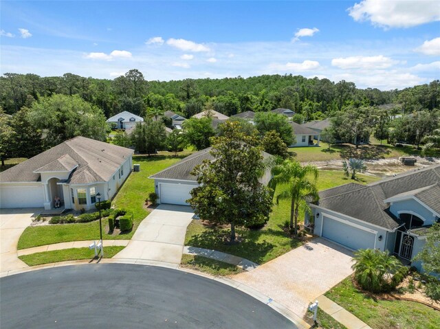 11220 Godwit Ct, New Port Richey, FL 34654 - aerial view of residential area with a heavily wooded area