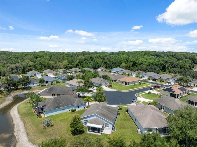 11220 Godwit Ct, New Port Richey, FL 34654 - aerial view of residential area featuring a heavily wooded area