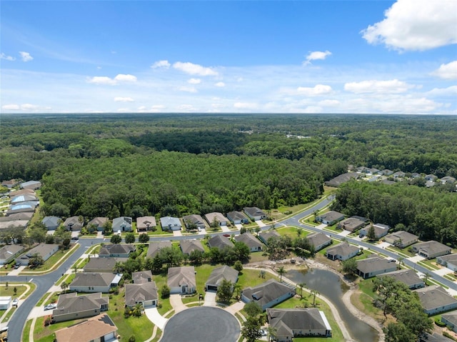 11220 Godwit Ct, New Port Richey, FL 34654 - aerial overview of property's location with a forest and nearby suburban area