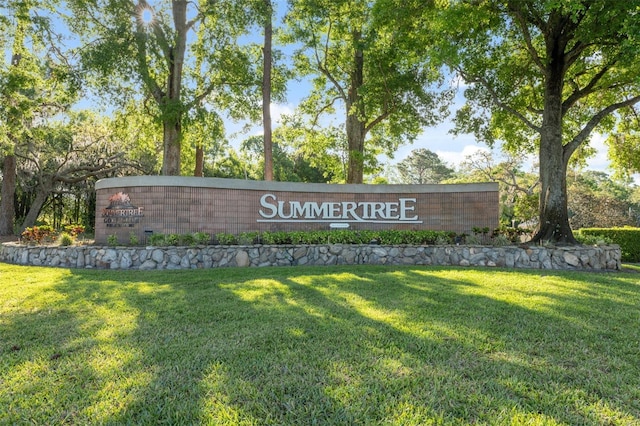 11220 Godwit Ct, New Port Richey, FL 34654 - community / neighborhood sign featuring a lawn