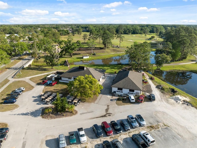 11220 Godwit Ct, New Port Richey, FL 34654 - bird's eye view of a large body of water, a tree filled landscape, and a golf club