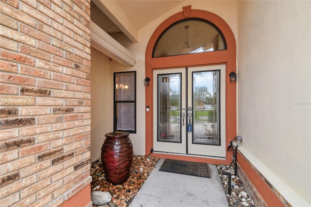 1831 Stable Trl, Palm Harbor, FL 34685 - entrance to property featuring french doors and stucco siding