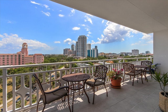 balcony featuring a city view