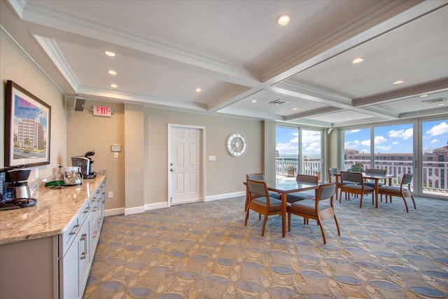 dining area featuring beam ceiling, ornamental molding, coffered ceiling, recessed lighting, and dark carpet