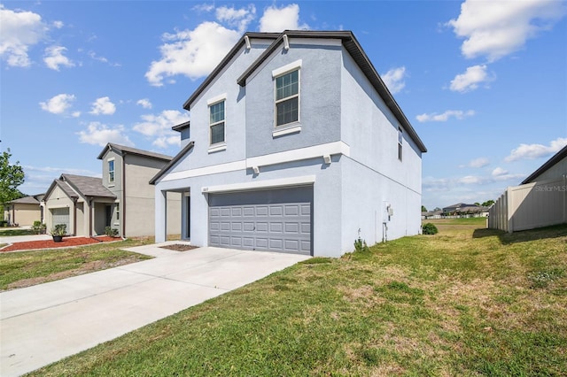 view of front of property featuring an attached garage, a front lawn, stucco siding, and driveway