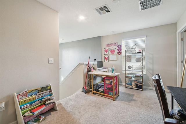 carpeted home office featuring baseboards and visible vents