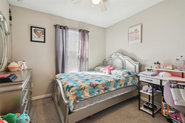 bedroom with carpet floors, baseboards, and a ceiling fan