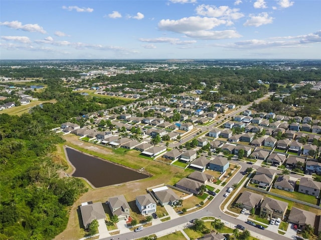 aerial view featuring a residential view and a water view