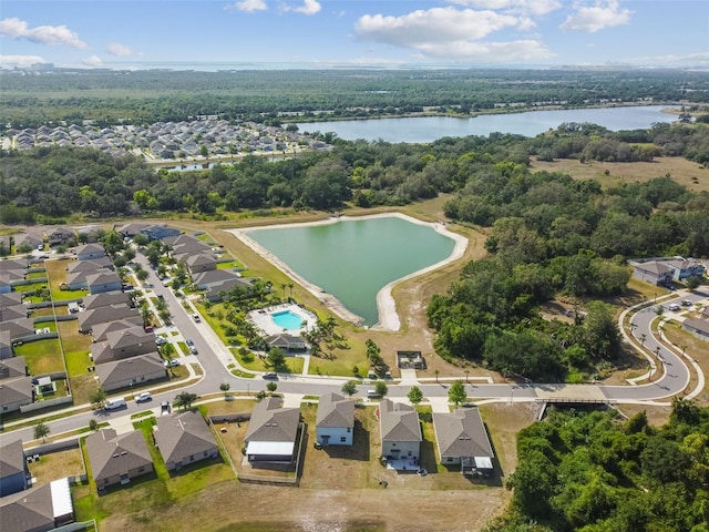 aerial view with a water view and a residential view