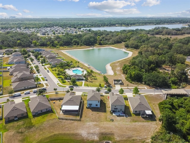 bird's eye view featuring a residential view and a water view
