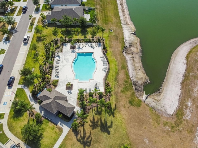 birds eye view of property featuring a water view