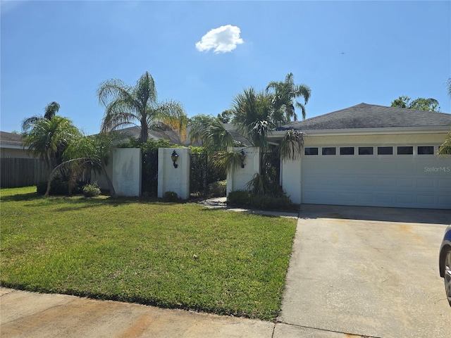 ranch-style home with concrete driveway, fence, a front lawn, and a garage