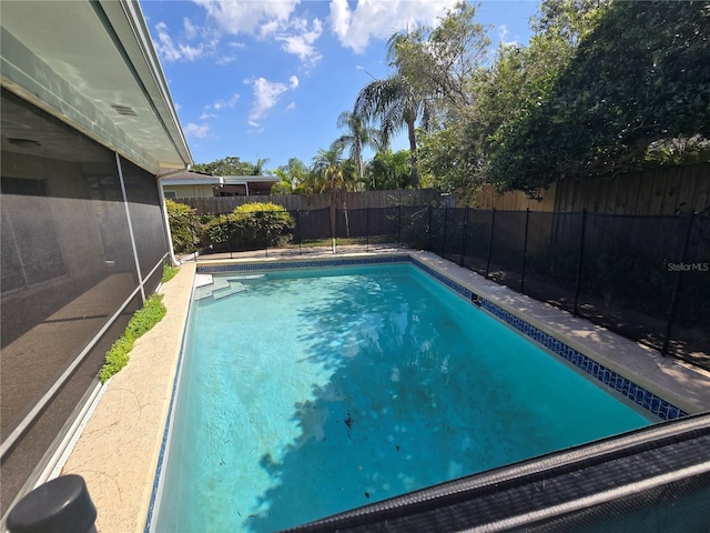 view of pool featuring a fenced in pool and a fenced backyard