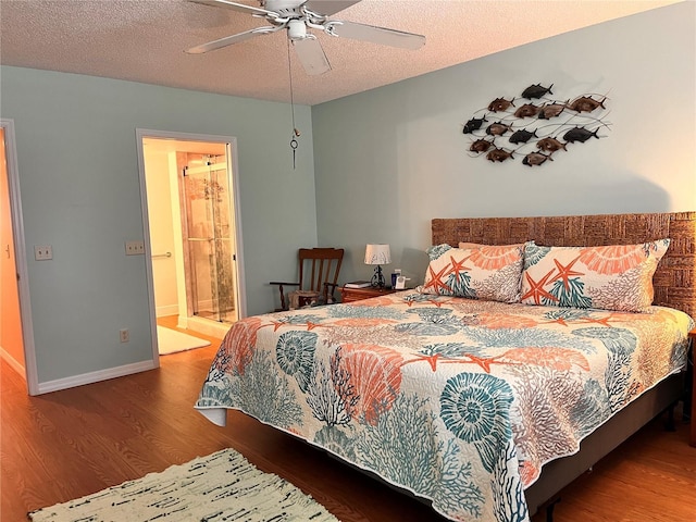 bedroom featuring a textured ceiling, wood finished floors, and ceiling fan