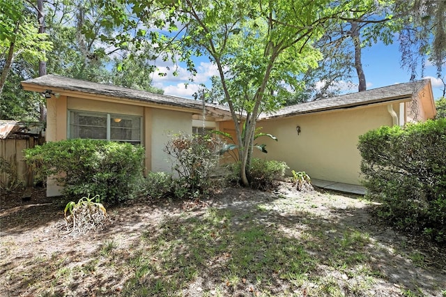 14615 Daybreak Dr, Lutz, FL 33559 - view of home's exterior with stucco siding