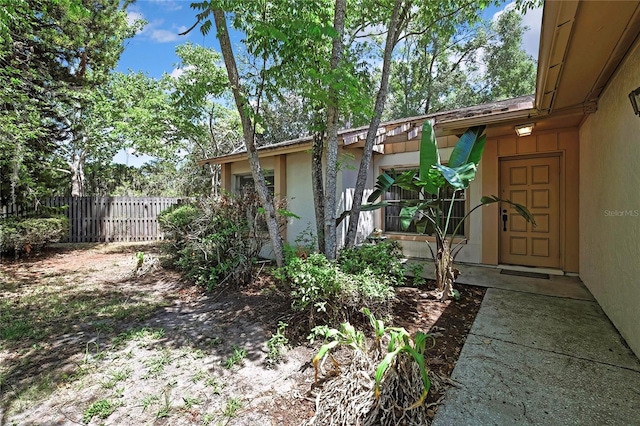 14615 Daybreak Dr, Lutz, FL 33559 - view of exterior entry with stucco siding