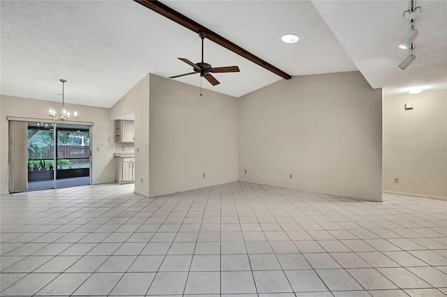 14615 Daybreak Dr, Lutz, FL 33559 - unfurnished living room featuring ceiling fan, a chandelier, track lighting, and a textured ceiling