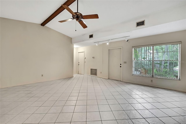 14615 Daybreak Dr, Lutz, FL 33559 - empty room with rail lighting, ceiling fan, and light tile patterned flooring