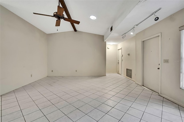 14615 Daybreak Dr, Lutz, FL 33559 - unfurnished room with a ceiling fan, light tile patterned floors, and rail lighting
