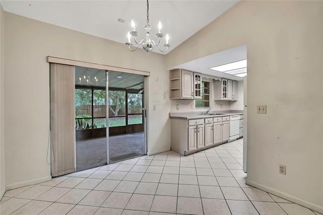 14615 Daybreak Dr, Lutz, FL 33559 - unfurnished dining area featuring a chandelier, vaulted ceiling, and light tile patterned floors