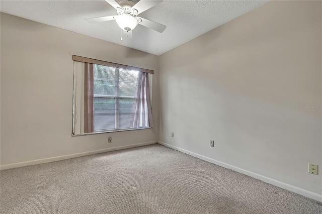 14615 Daybreak Dr, Lutz, FL 33559 - carpeted spare room with a ceiling fan and a textured ceiling