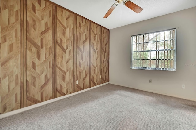 14615 Daybreak Dr, Lutz, FL 33559 - spare room featuring ceiling fan and carpet