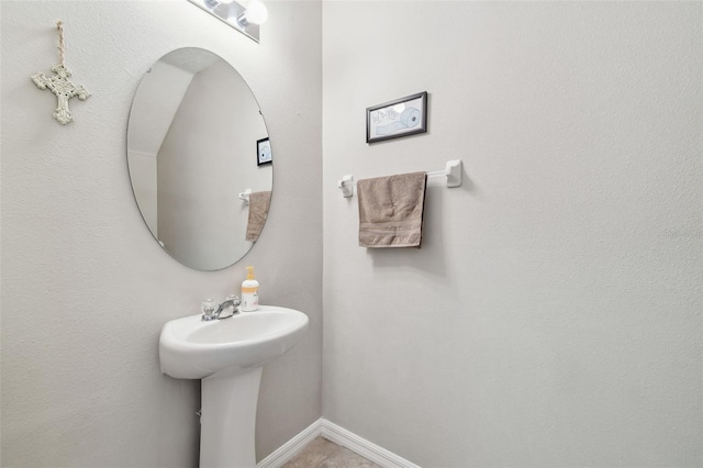 10148 Rose Petal Pl, Riverview, FL 33578 - bathroom with baseboards and a sink