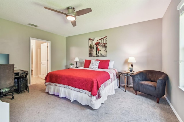 10148 Rose Petal Pl, Riverview, FL 33578 - bedroom featuring visible vents, carpet floors, baseboards, ceiling fan, and connected bathroom