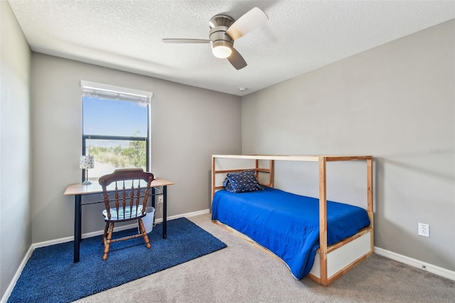 10148 Rose Petal Pl, Riverview, FL 33578 - bedroom with baseboards, carpet flooring, a textured ceiling, and ceiling fan
