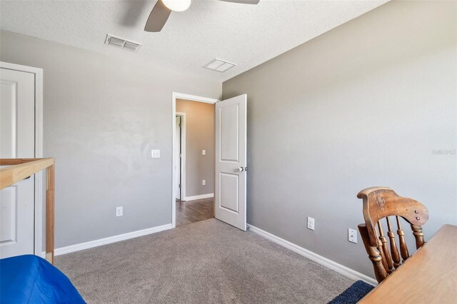 10148 Rose Petal Pl, Riverview, FL 33578 - carpeted bedroom featuring visible vents, a ceiling fan, a textured ceiling, and baseboards