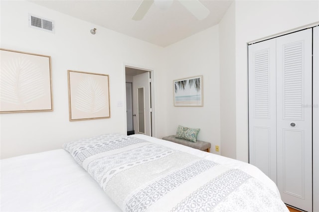 bedroom with a ceiling fan, a closet, and visible vents