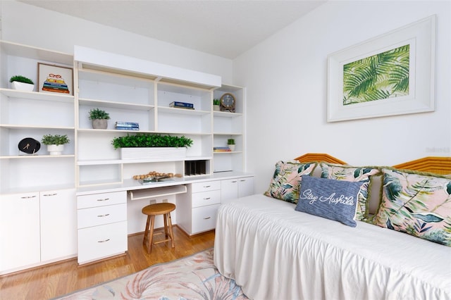 bedroom with light wood-style flooring