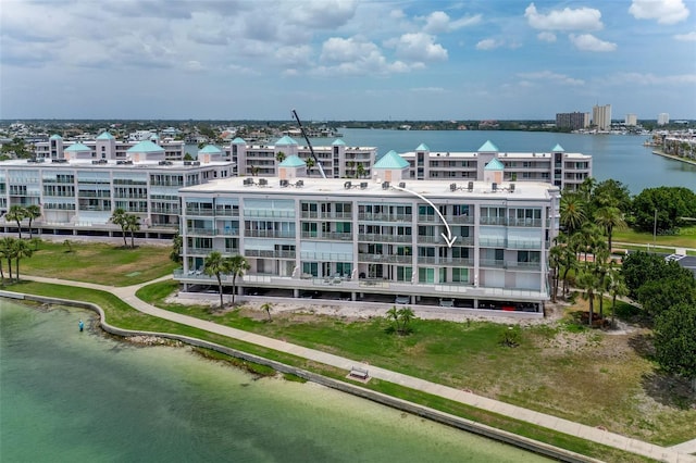 birds eye view of property featuring a water view