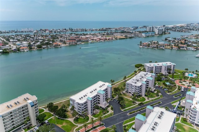 drone / aerial view with a city view and a water view