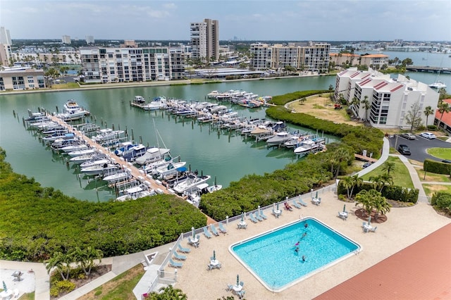 bird's eye view featuring a water view and a view of city