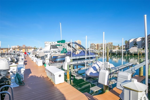 view of dock featuring a water view and boat lift